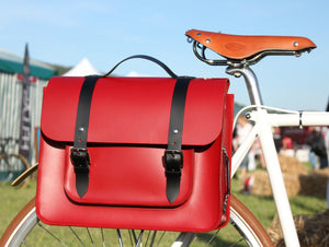 Hill anEllis Birtie Red Leather Pannier on a white bicycle