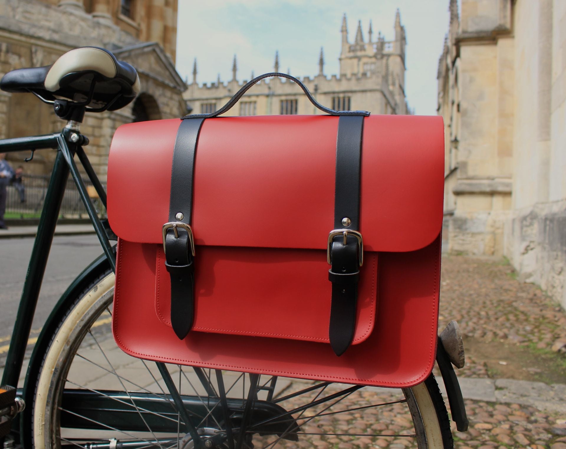 Hill anEllis Birtie Red Leather Pannier on a bicycle