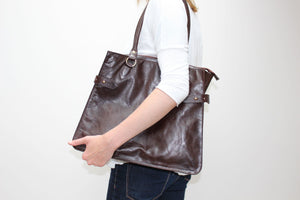 Hill and Ellis Dorothy dark brown leather pannier front with model