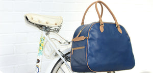 Hill and Ellis Birkdale Blue leather pannier on a bicycle