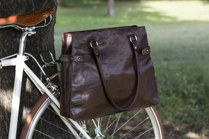 Hill and Ellis Dorothy dark brown leather pannier on a bicycle