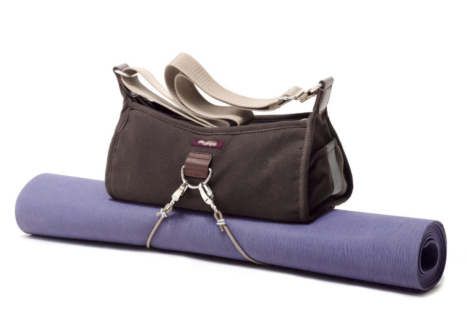 Po Campo Pilsen Bungee with yoga matt attached underneath the handbag 